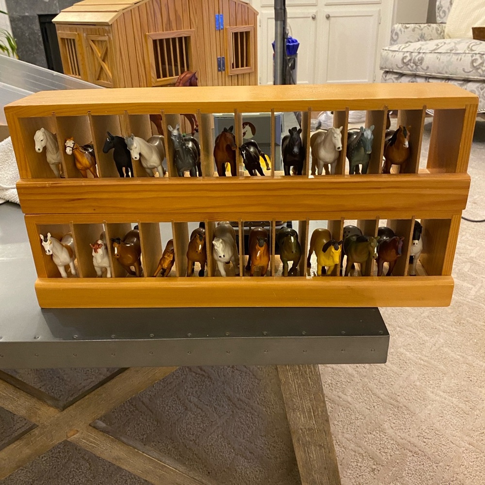 Miniature horses in stalls
